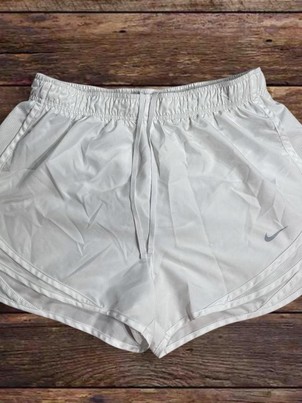 Nike Women's White Athletic Shorts with Gray Swoosh